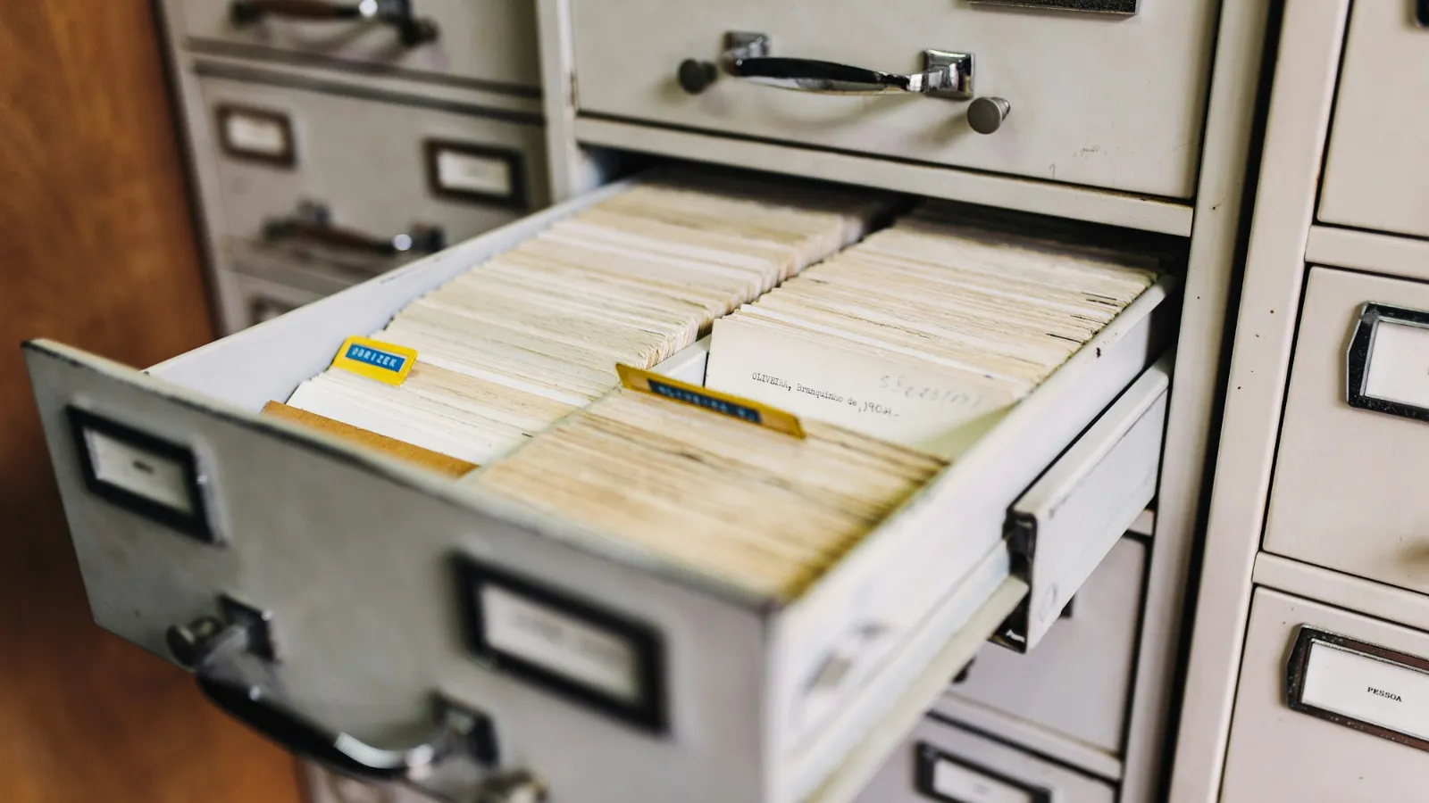 Archive file cabinet drawers representing saved website snapshots for recovery