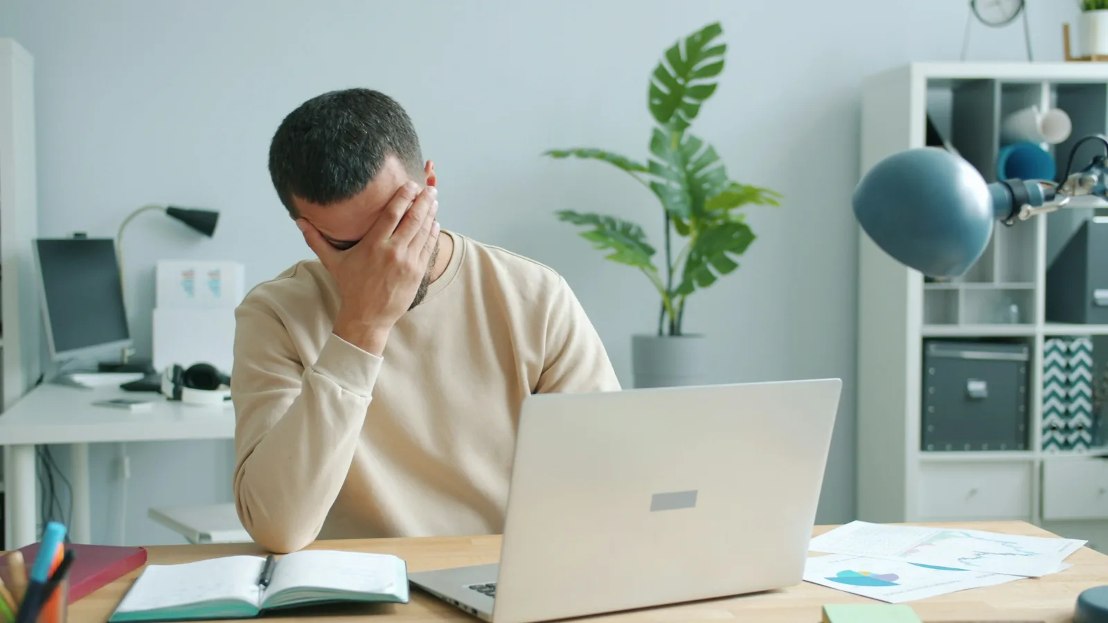Stressed business owner at a laptop after his WordPress website stopped loading